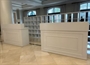 Wood Top Registration Desk with Shelves in Orlando