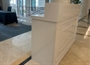 Wood Top Registration Desk with Shelves in Orlando