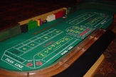 Green and Wood Craps Table w/ Croupiers in Tampa, St Petersburg