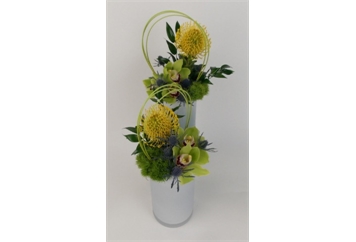 Designed Floral Arrangement in White Cylinder in Orlando